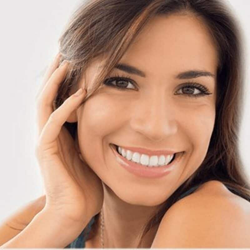 A patient with a healthy, confident smile